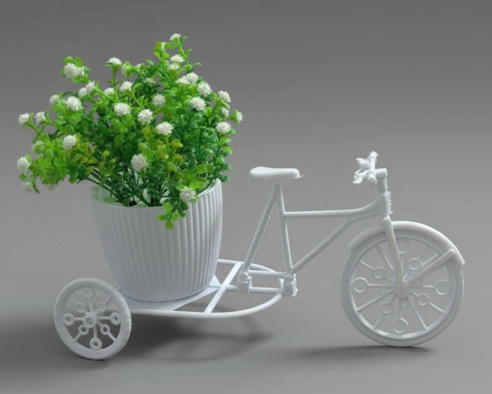 White bicycle-shaped planter with a potted plant 